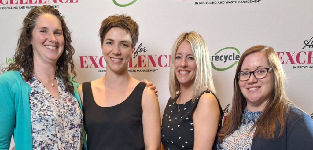 Image shows four council officers at the awards ceremony.